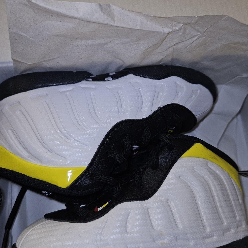 Black and White Sneakers with Yellow Accents